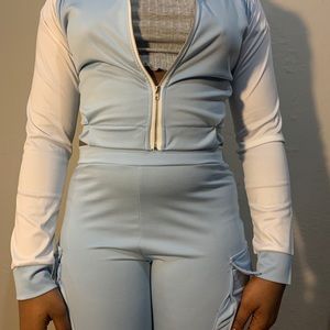 Blue and white track suit